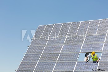 Engineer fixing solar panels