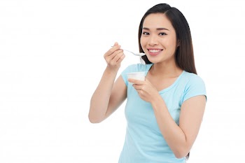 Enjoying greek yogurt Free Photo