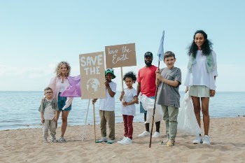 Environmentalists Standing Together at a Beach