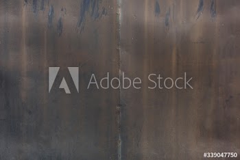 Eroded metal wall