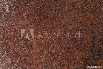 Eroded metal wall