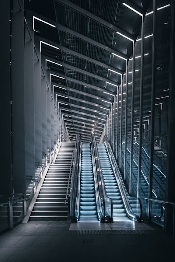 escalator beside staircase