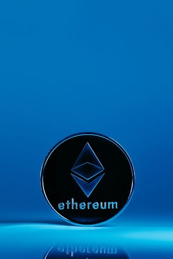 Ethereum Cryptocurrency Coin on Blue Background