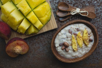 Exotic coconut rice and beans dessert with mango 