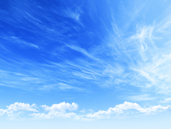 Expansive Bright Blue Sky with Wispy Clouds