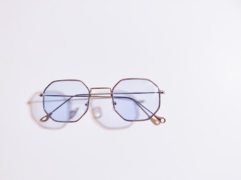 Eyeglasses On White Surface