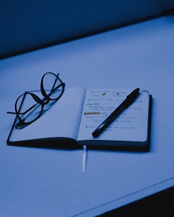 Eyeglassses on Book