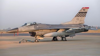 F-16 Fighting Falcon Military Jet on Airfield