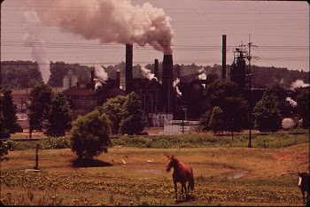 Factory smoke across pasture land. | Free Photo - rawpixel
