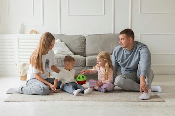 Family Bonding Time Playing with Toys on the Floor