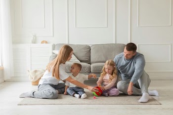 Family Playing Together on the Floor