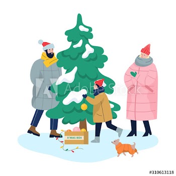 Family standing at the christmas tree