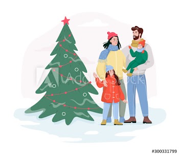 Family standing on the street at the christmas tree