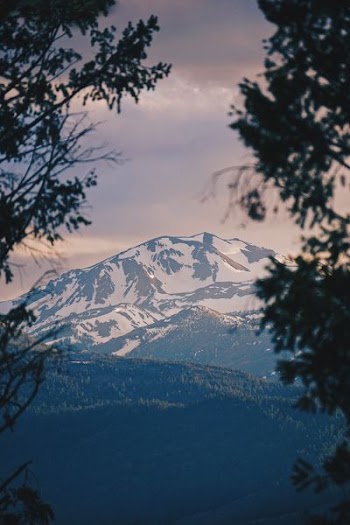 far mountain field with snow
