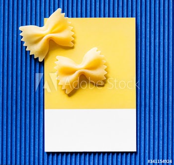 Farfalle pasta on a yellow card