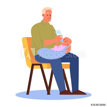 Father feed his baby son sitting on the chair