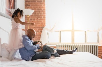 Father Having Lots Of Fun With His Kids