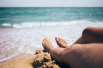 Feet At Waters Edge
