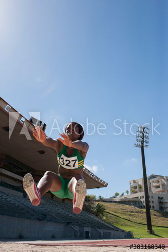 Female athlete long jumping