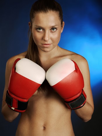 Female fighter brutal with rught gloves