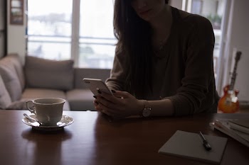 Female holding an iPhone 8 Plus
