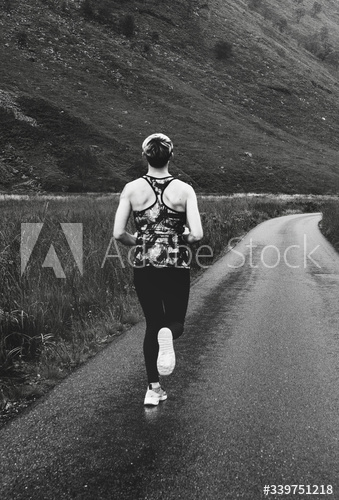 Female jogger in the Highlands