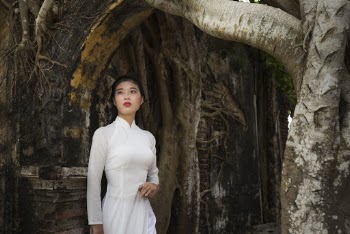 Female Model in a White Dress Underneath and Arc