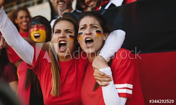 Females from Germany cheering from fan zone