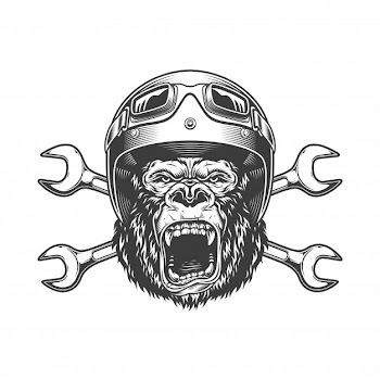Ferocious gorilla head in moto helmet Free Vector