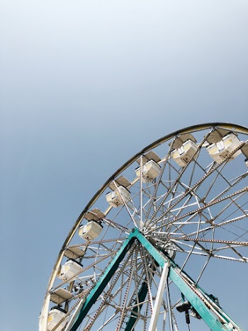 Ferris Wheel over a Blue Sky
