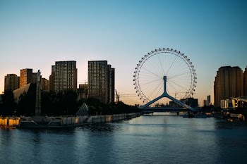 ferris wheel over body of water