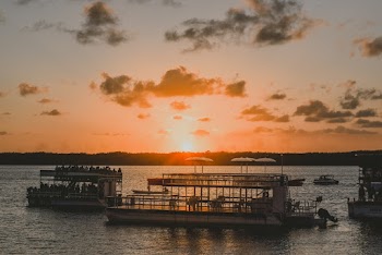 Ferry In Body of Water during Golden Hour