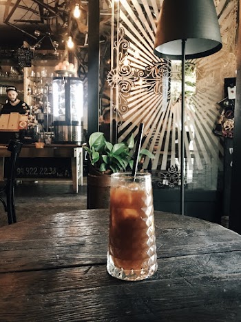 Filled Clear Glass With Black Straw