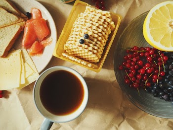 Filled Mug Beside a Cookie Filled Pack