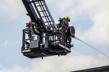 Firefighters on crane, April 29, | Free Photo - rawpixel