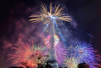 fireworks display near tower during night time