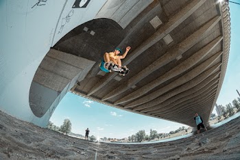 Fish Eye Photography of Man Doing Skateboard Trick