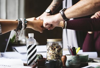 Fistbump Over Desk