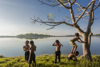 Five Boys Standing Near Body of Water