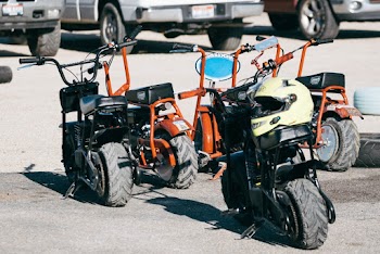 Five Brown and Black Minibikes