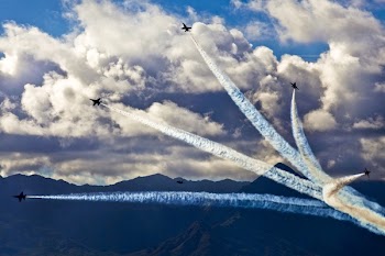 Five Fighting Plane With Smoke in Mid-air