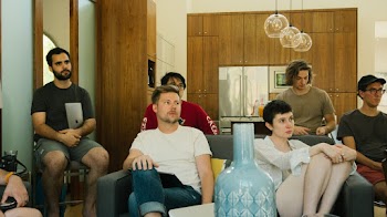 Five Men and Woman in Dining Area
