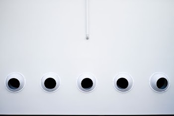 five white security camera on wall