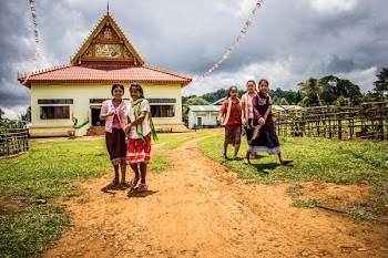 Five Women Walking on Green Grasses