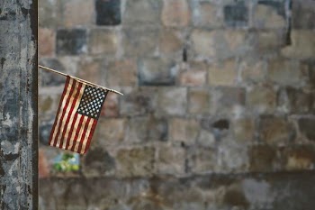 flag of America hanging on wall