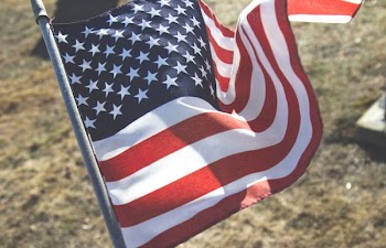 flag of USA with gray pole