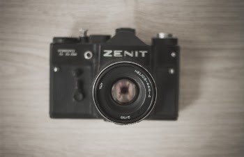 Flat-lay Photograph of Black Zenit Camera
