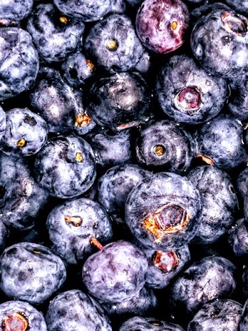 Flat Lay Photography of Bunch of Blueberries