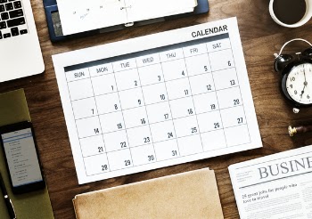 Flat Lay Photography of Calendar