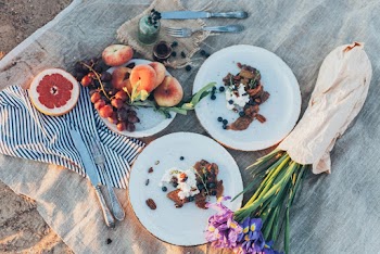 Flat Lay Photography of Cooked Meat and Sliced Vegetables